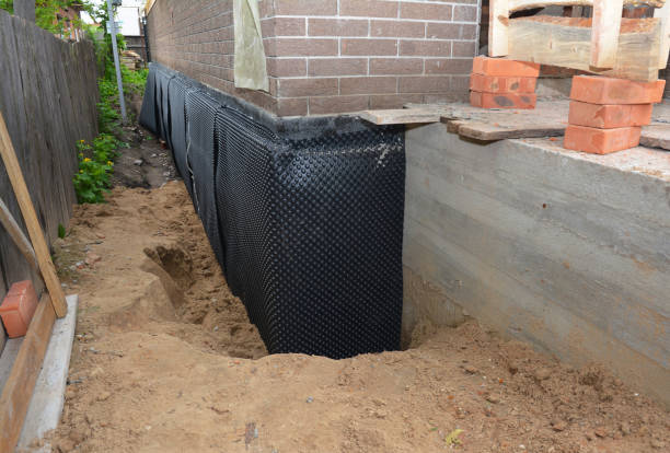 SJ Waterproofing Pros technician performing targeted Foundation Crack Repair assessment in Tennessee Ridge, TN